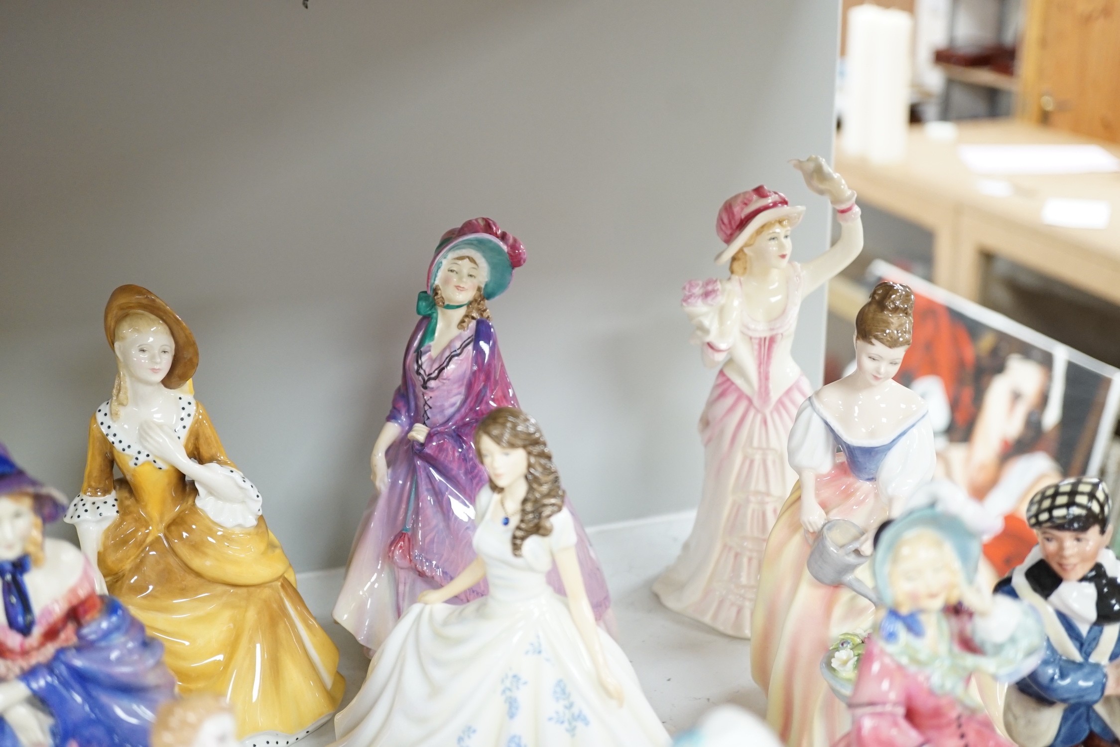 A quantity of Royal Doulton figures, to include Peggy, Valerie, Dinky Do, Penelope, Cissie, and others. Approx. Twenty-four